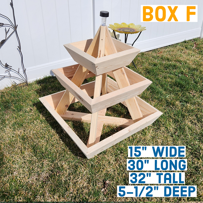 Wooden tiered planter on grass with dimensions displayed